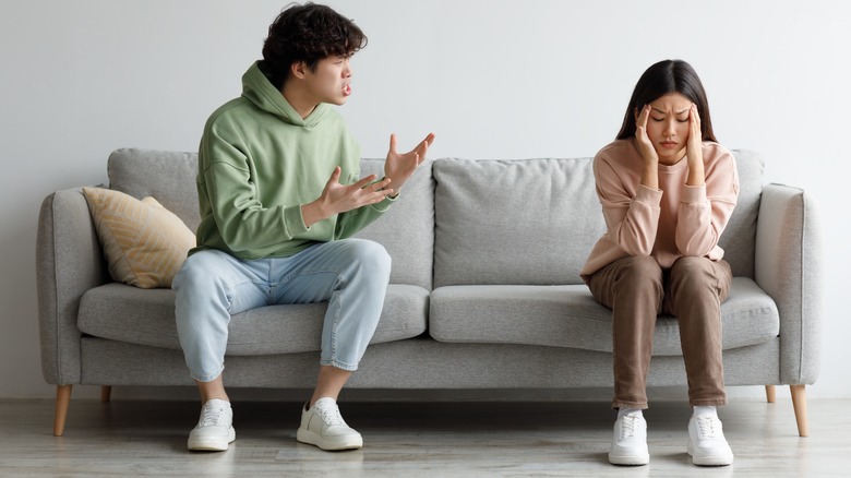 Man yelling at woman