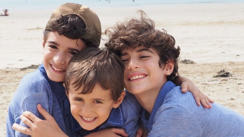 Tala Alamuddin's sons hugging and smiling