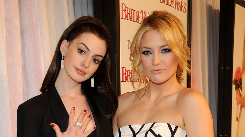 Anne Hathaway and Kate Hudson posing together