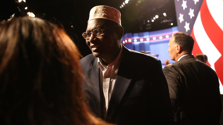 Malik Obama speaks to attendees