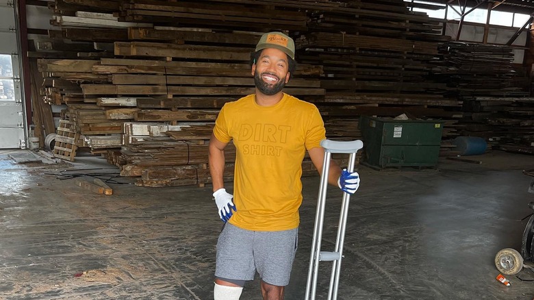 Wendell Holland smiling with his hand on his hip