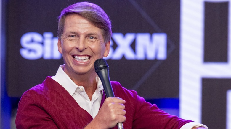 Jack McBrayer smiling with microphone