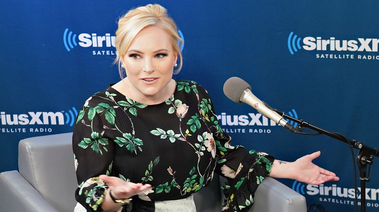 Meghan McCain speaking into microphone