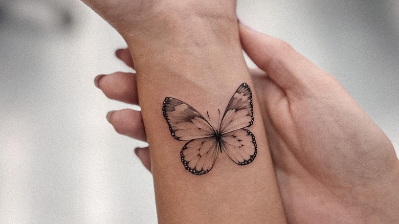 Wrist butterfly tattoo