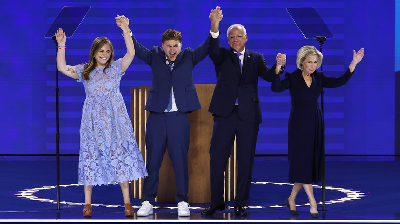 Walz family raising arms at DNC 2024