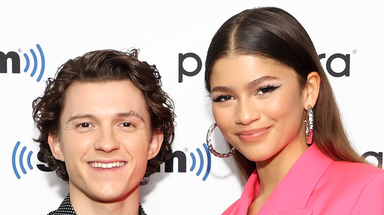 Tom Holland and Zendaya smiling