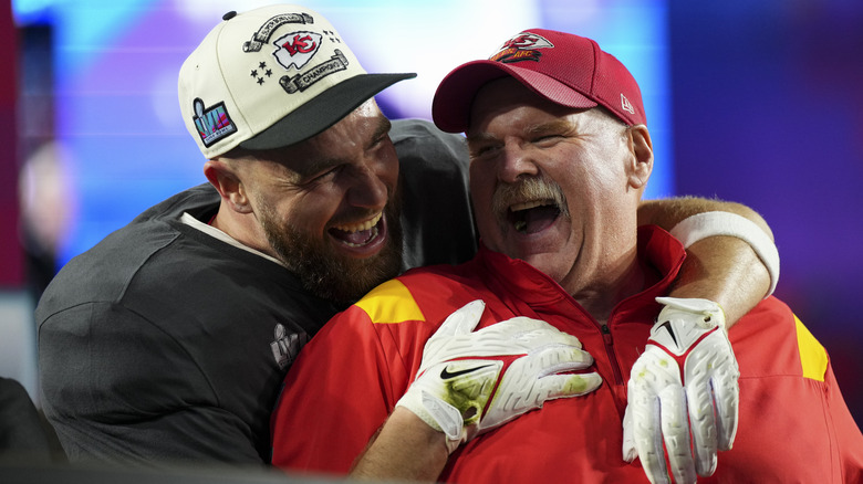 Travis Kelce hugging Andy Reid