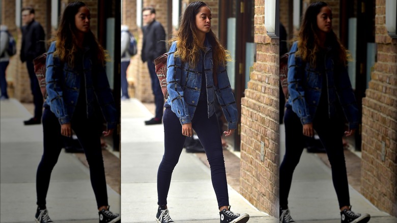 Malia Obama walking by herself