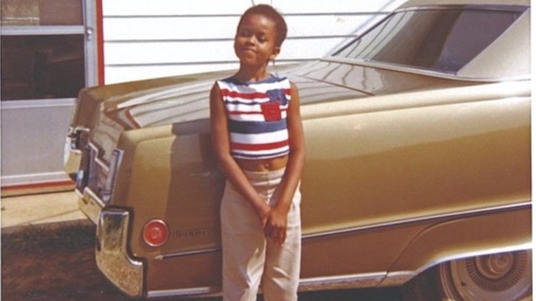 young Michelle Obama looking self-assured