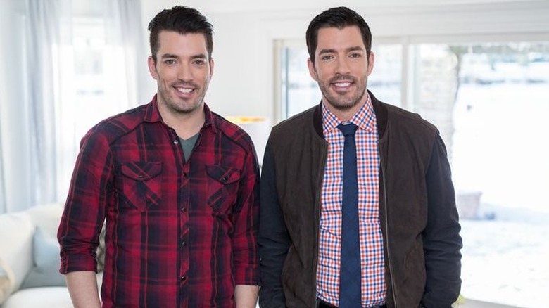 Drew and Jonathan Scott pose in a promo shot for Property Brothers