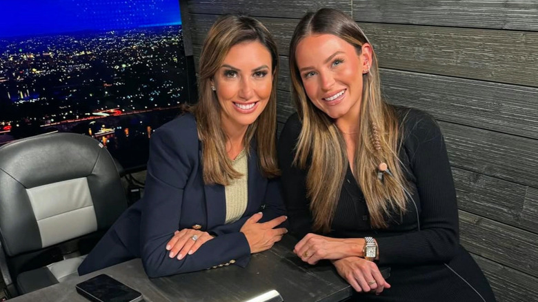 Alina Habba and Margo Martin smiling at desk