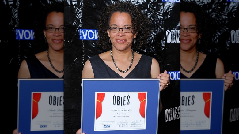 Ami Brabson posing with the Andre Braugher Obie award