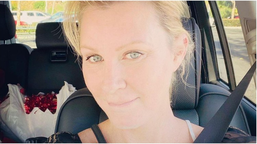 Sandra Lee takes a selfie in a car.