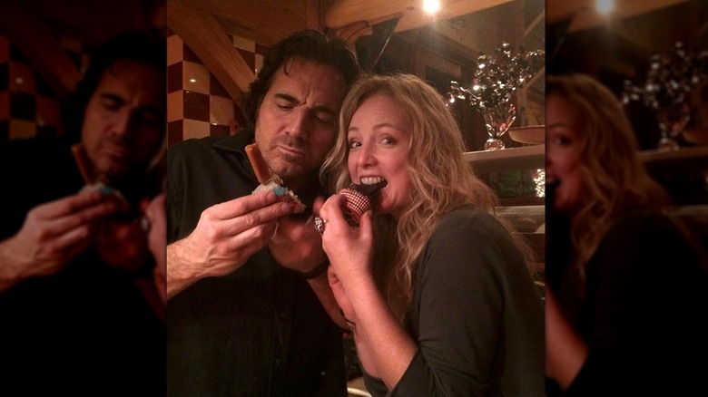 Thorsten Kaye and Susan Haskell sharing a cupcake