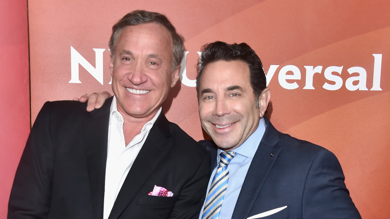 Dr. Terry Dubrow and Dr. Paul Nassif posing