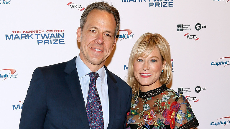 Jake Tapper poses with wife Jennifer Marie Brown on red carpet in 2017.