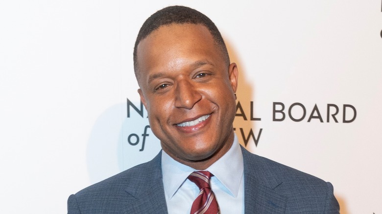 Craig Melvin smiling on the red carpet