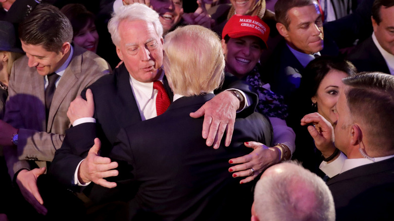 Robert Trump hugging Donald Trump