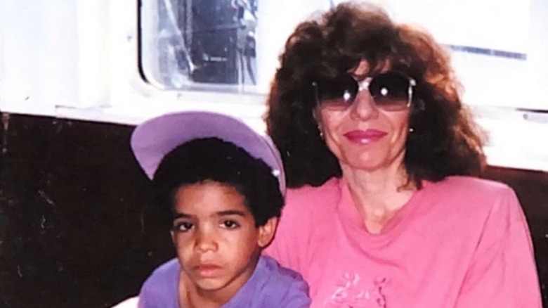 An old school shot of Drake with his mom