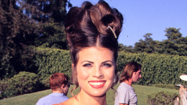 Yasmine Bleeth at event in '90s