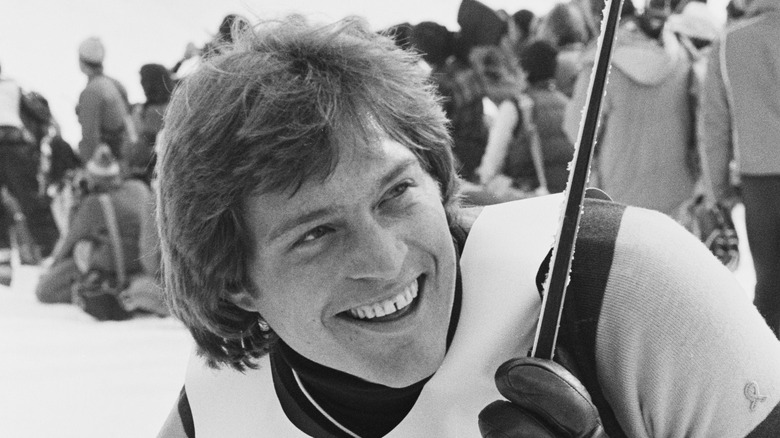 Black and white photo of Michael Ford smiling in 1979