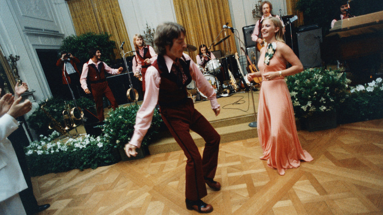 Susan Ford and her date dancing at their prom at the White House in 1975