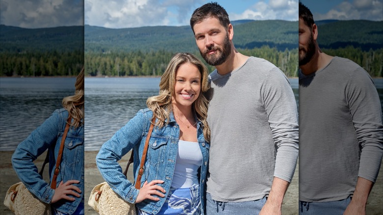 Stephanie Bennett and Casey Deidrick posing in front of water