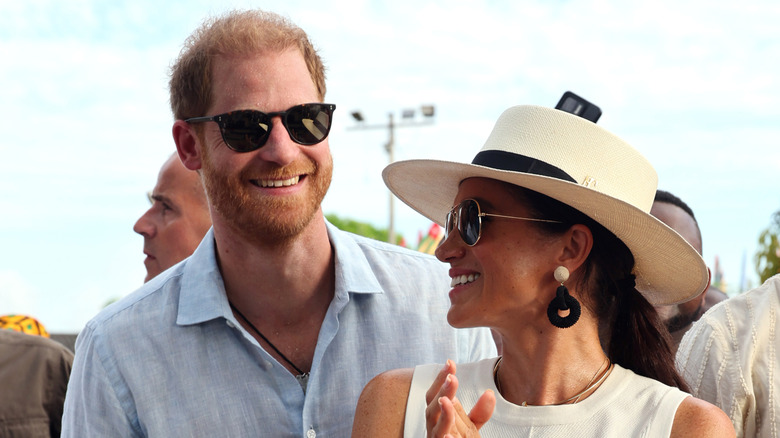 Prince Harry and Meghan Markle in sunglasses