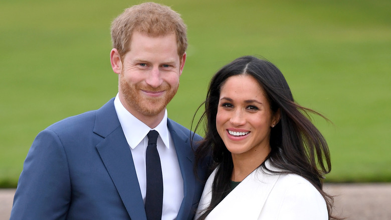 Prince Harry and Meghan Markle smiling together