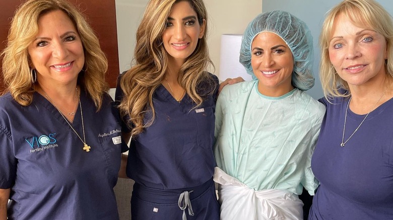 Alison Victoria poses with IVF clinicians