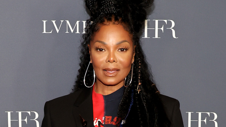 Janet Jackson posing on a red carpet