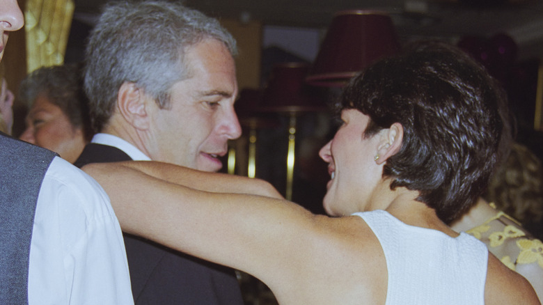 Jeffrey Epstein and Ghislaine Maxwell leaning on each other