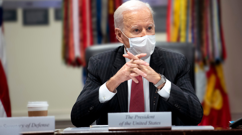 Joe Biden wearing a mask to a White House meeting in 2021