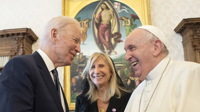 Pope Francis and Joe Biden smiling