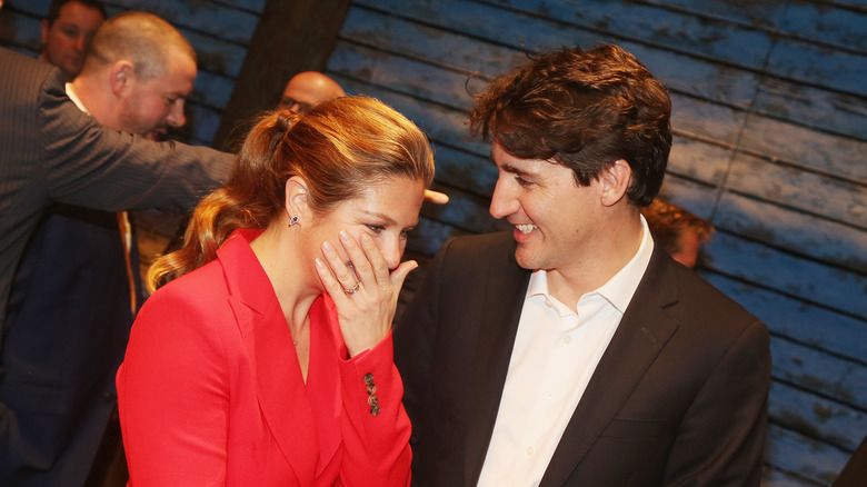 Sophie and Justin Trudeau laughing at the backstage of a musical in 2017