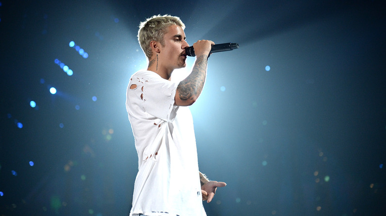 Justin Bieber singing on stage