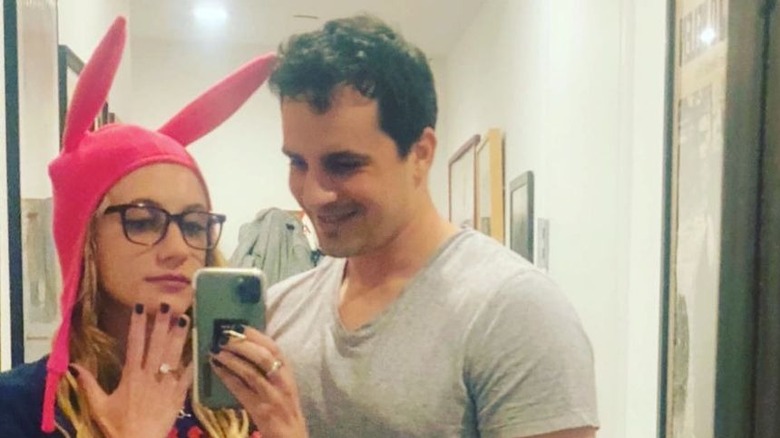 Kat Timpf and Cameron Friscia taking a selfie