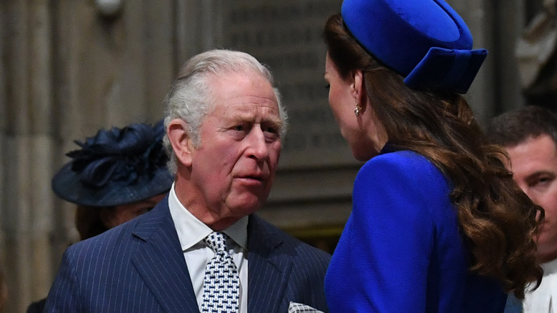 King Charles talking to Princess Catherine