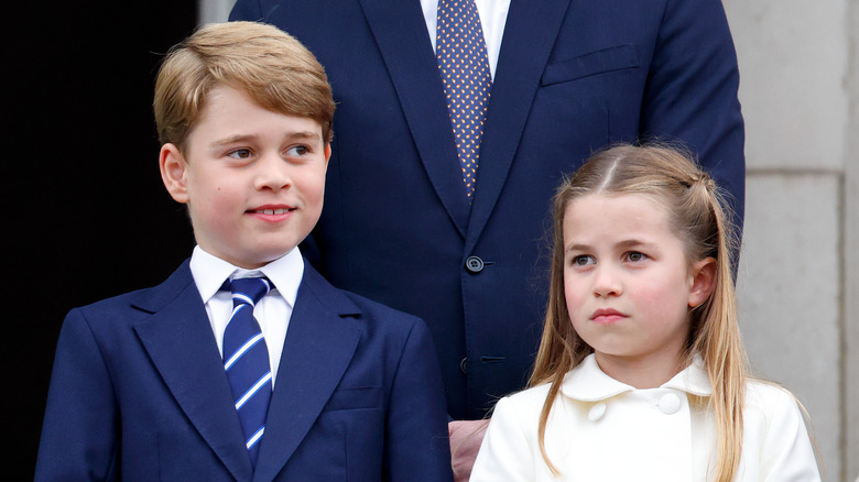 Prince George and Princess Charlotte standing together