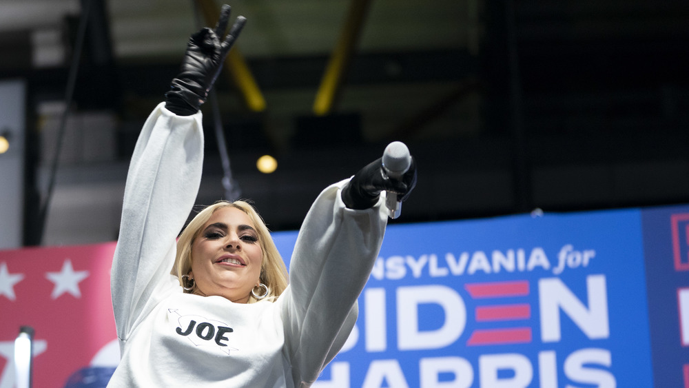 A performing Lady Gaga with a Joe sweatshirt on 