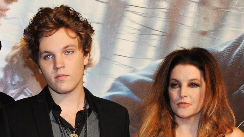 Benjamin Keough with mom at premiere