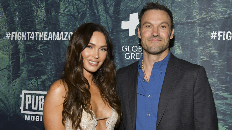 Megan Fox and Brian Austin Green posing for photos