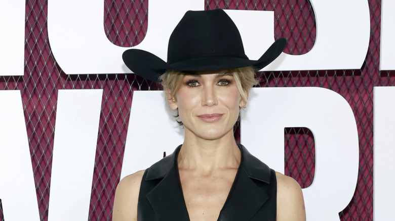 Jennifer Landon posing in a cowgirl hat