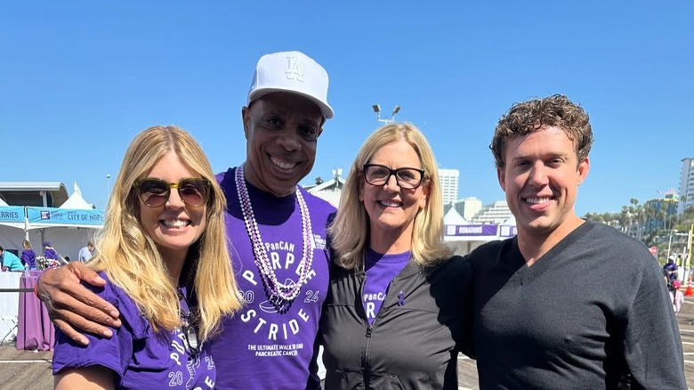 Shawna Landon, Leslie Landon, and Sean Landon taking a picture together at Purple Stride