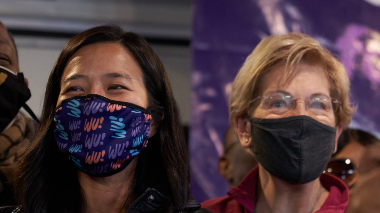 Michelle Wu and Elizabeth Warren in masks