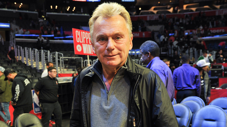 Pat Sajak smiling at basketball game