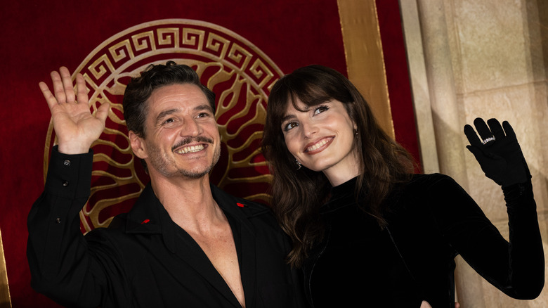 Pedro Pascal and Lux Pascal smiling and waving