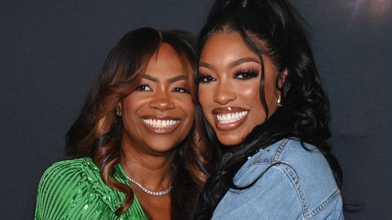 Kandi Burruss and Porsha Williams smiling