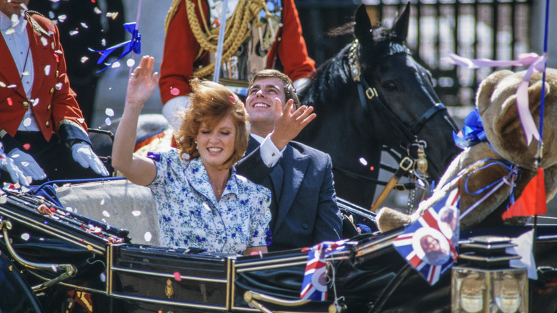 Prince Andrew and Sarah Ferguson in honeymoon carriage with bear