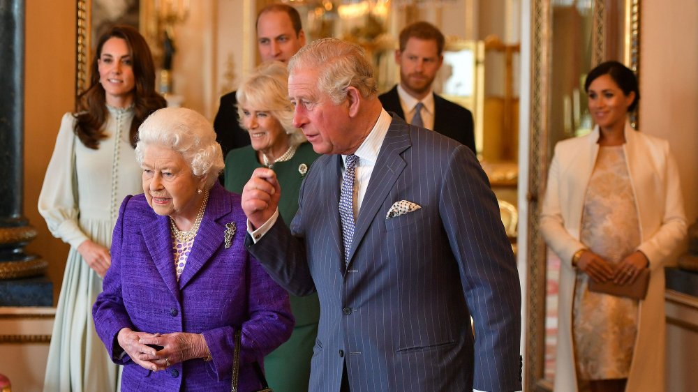 Queen Elizabeth, Prince Charles, and family